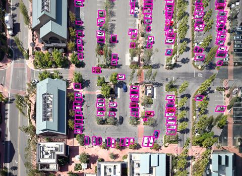 Aerial view of residential neighborhood with AI roof detection overlays